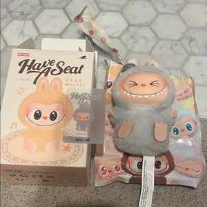 Pop mart 
Labubu- Take a seat 
Authentic